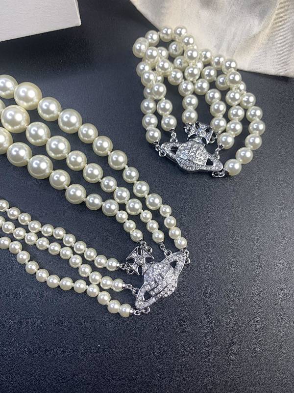 Three layer pearl while gold set